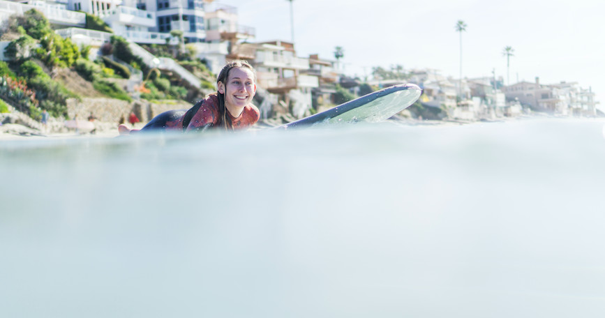 a person riding on the back of a boat