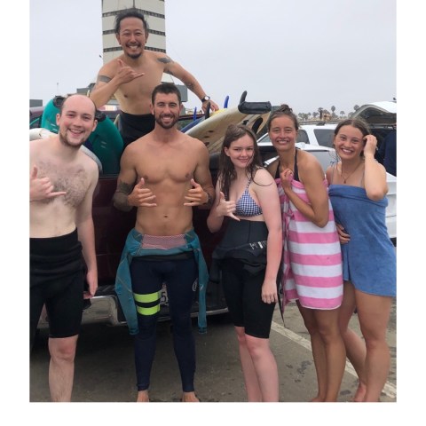 a group of people posing for the camera