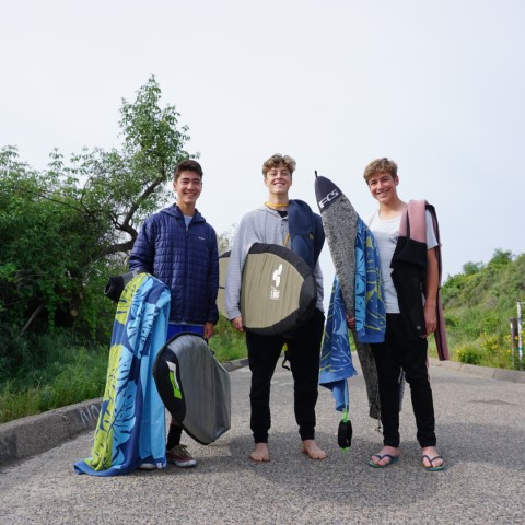 a group of people posing for the camera